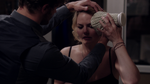 Graham helps Emma with her injuries after her fight with Regina