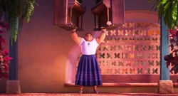 Luisa lifting two large and heavy pianos with little effort.