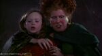 Dani and Winifred are shocked when they see Max consume the potion.