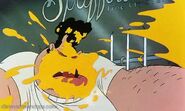 Louie getting his face splattered with mustard