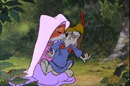 Maid Marian kisses Skippy's cheek