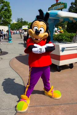 Max, posing for a photo at one of the Disney parks.