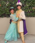 Jasmine and Aladdin posing in their new look for Disney Parks.