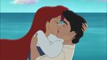 Ariel and Eric sharing a kiss.