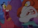 Rajah scares Iago.