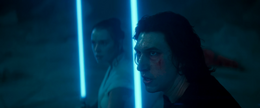 Rey and Ben stand to confront Palpatine together.