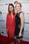 Jamie Chung and Elizabeth Banks at premiere of Resident Advisors in March 2015.