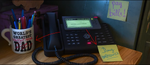Doug's phone number on a sticky note next to Bellwether's phone