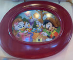 Webby, sporting her DuckTales (2017 series) design, visible in a photo hanging on the wall of Goofy's Playhouse