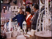 Mary Blair shows Walt and Julie Rheim plans for It's a Small World