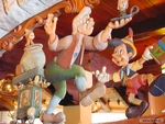 Au-Chalet-de-la-Marionnette-03.jpg (781 KB) Pinocchio and Geppetto on a woodcarving in Au Chalet de la Marionnette.