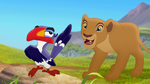 Nala bends down to talk to Zazu