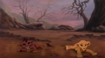 Cub Kovu on the ground after Kiara accidentally bumps into him...