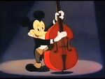 Mickey playing bass