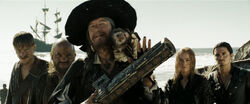 Barbossa holding Sao Feng's charts in Davy Jones' Locker.