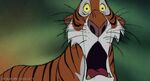 Shere Khan freaks out about his tail on a stick of fire