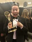 Sam Riegel poses in the press room at the 70th annual Emmy Awards in September 2018.