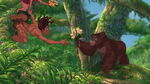 Kala receiving flowers from Tarzan and Jane