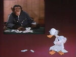 Ludwig playing poker with a monkey.