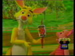 Rabbit shows Piglet a sign.