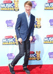 Calum Worthy attending the 2014 Radio Disney Music Awards.