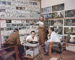 Penner reviewing the storyboard of the christening scene from Sleeping Beauty with Clyde Geronimi, Joe Rinaldi, and Walt Disney, c. fall 1956.