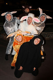 The Lost Boys posing for a photo at one of the Disney Parks.