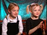 Dakota (left) with her sister, Elle (right) interview from My Neighbor Totoro in 2005