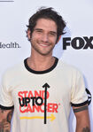 Tyler Posey attending the 6th biennial Stand Up to Cancer event in September 2018.