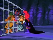 AdventuresOfTheGummiBears-ForWhomTheSpellHolds-CagedGummies.png (351 KB) Zorlock caging all three adult Gummies