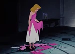 Cinderella glumly looks down at the ruins of her dress.