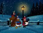 Donald, Minnie and Goofy singing "Deck the Halls"
