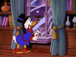 Scrooge admiring his pearl