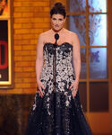 Idina Menzel speaks onstage during the 64th annual Tony Awards in June 2010.