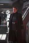 Hux with Stormtroopers lining up in the background.