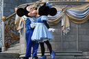 Mickey kisses Minnie