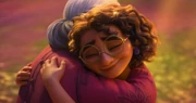 Mirabel reconciles with her Abuela Alma as they share a hug after a decade.