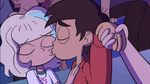 Jackie and Marco kissing