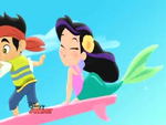 Marina enjoys flying on the surfboard with Jake.