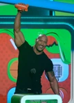 Dwayne Johnson speaks onstage at the 26th annual Nickelodeon Kids' Choice Awards in April 2013.