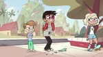 Jackie rolls away on half a skateboard