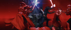 Kylo and Rey fight the Praetorian guards together.