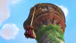 Mother Gothel being pulled up to tower