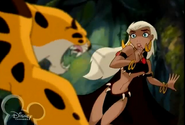 A depowered Queen La is cornerned by a rogue leopard.