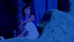 Aladdin looks out into the city, and the palace; dreaming of a better life.