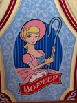 Her poster in Toy Story Mania! poster