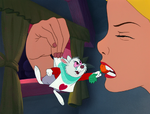 Giantess Alice eats a carrot held by a White Rabbit