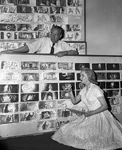 SleepingBeauty1959ProductionPhoto24.jpg (263 KB) Eric Larson and Mary Costa discuss the storyboards for "The Curse is Fulfilled" sequence.