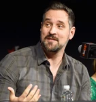 Travis Willingham speaks at the 2019 New York Comic Con.