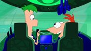 Phineas and Ferb getting ready to go inside Pinky in their shrinking submarine.